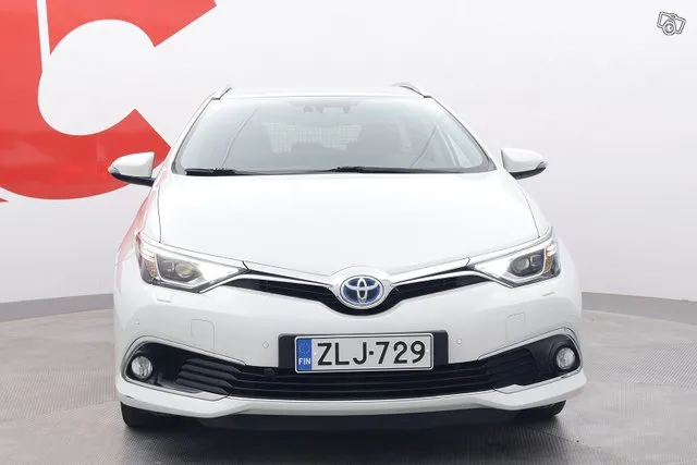 Toyota Auris Touring Sports 1,8 Hybrid Premium - PUOLINAHAT / 1-OMISTAJA / LOHKOLÄM. / NAVI / HUIPPUVARUSTELTU PREMIUM MALLI / UUDET KESÄRENKAAT Image 8